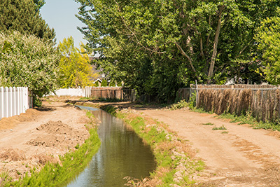 The roads on the banks on both sides of this Treasure Valley canal are private property belonging to the irrigation delivery system and are not public thoroughfares.